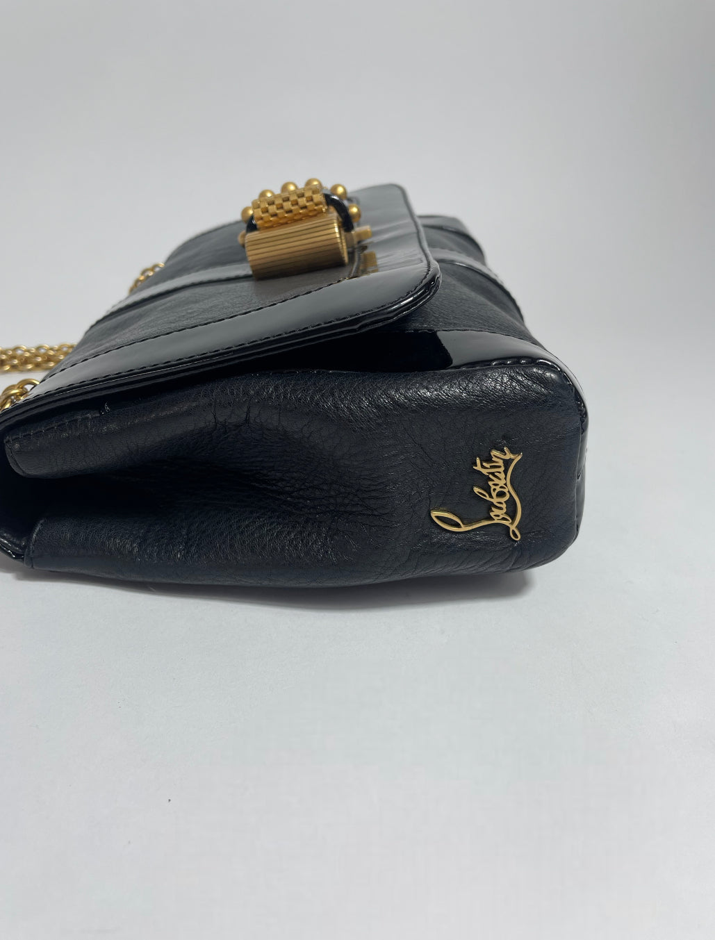 Louboutin dust sales bag uk